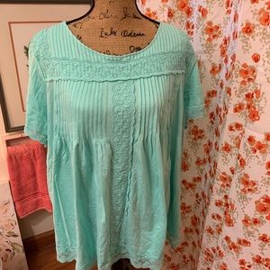 Mint green tunic with gorgeous lace detail.